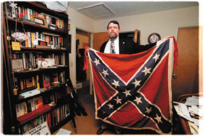 Kirk Lyons, shown here in his Black Mountain office, wants a more combative SCV. Photo By Jenny Warburg