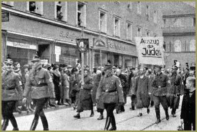 Facism in the past: Citizens out to applaud the 'exodus of the Jews' the morning after Kristallnacht, 1938.